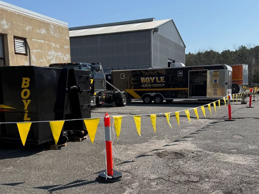 Boyle Contracting dumpster and trailer