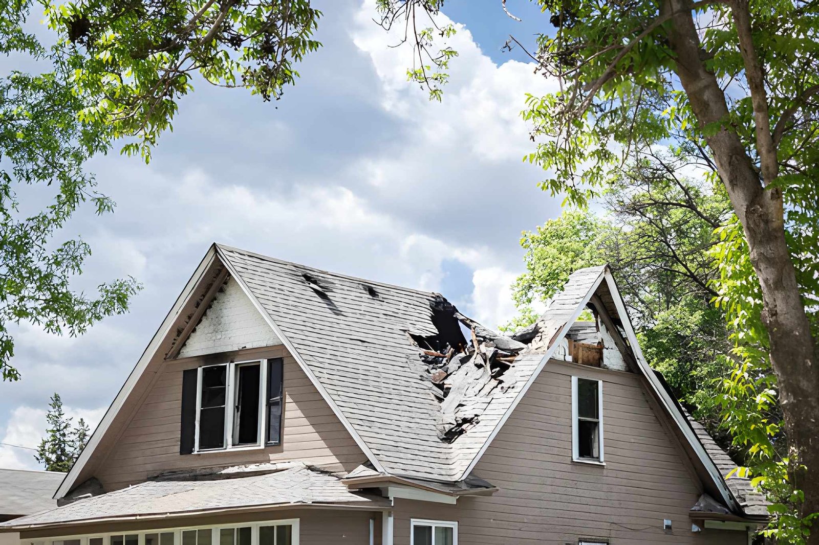 Roof of a house burned and caved in